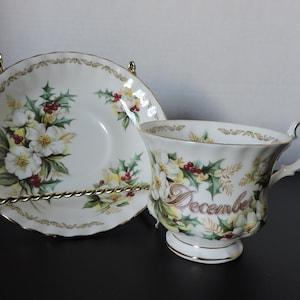 Christmas Rose December Cup and Saucer E & R Bouquet of the Month Series Golden Crown Bone China Collectible Service Tea Cup Roses Holiday