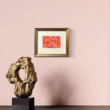 Gold framed and matted, signed hand colored Orchid linocut print