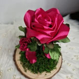 Eternal rose at the base of the trunk