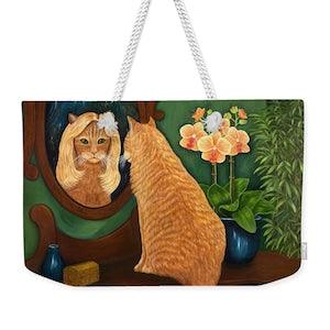 Orange Tabby Cat in Mirror Weekender Tote Bag. Ginger Cat in blonde wig and orchids. Colorful and whimsical bag.