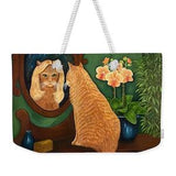 Orange Tabby Cat in Mirror Weekender Tote Bag. Ginger Cat in blonde wig and orchids. Colorful and whimsical bag.