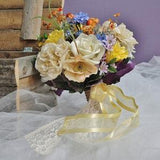 Bridal bouquet with ivory roses and peonies, yellow and orange flowers in a rustic boho style, Woodland wedding