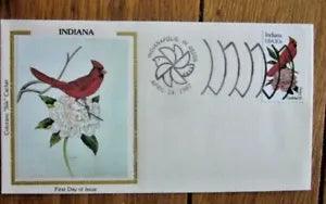 Silk fabric with red cardinal and peony floral pattern on white background