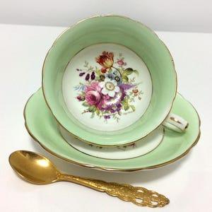 Vintage Hammersley & Co. bone china teacup, hand-painted bouquets, signed F. Howard, soft green background, #3069