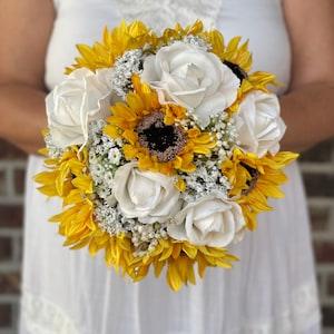 Sunflowers and white roses bouquet Sunflowers and baby??s breath bouquet Rustic Country Wedding