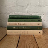 Neutral staging book stack, green and beige styling books, mantle decor, library decor, real prop books for office decor, coffee table books