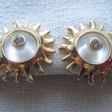Vintage gold tone sunflower clip on earring with sea shell and rhinestones