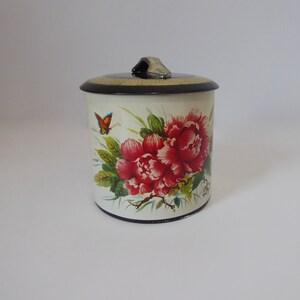 Round metal box with lid. Peony and butterfly bouquet box. 6 MB container made in Great Britain. Year 50. Bulk foods.