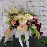 Wine Brides bouquet with Real touch orchids, ferns and eucalyptus. White roses, light blush Ranunculus and cabbage roses with pampas grass.