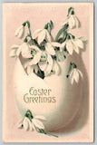 Postcard Easter Greetings Lilies Flowers Egg Embossed c1910 B8