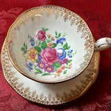 Queen Anne white and gold filigree pattern large pink rose bouquet.(hairline crack)