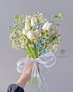 white tulip bouquet with assorted small flowers Flower Delivery
