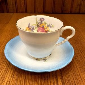 Royal Stafford Robins Egg Blue Teacup and Saucer, Rose and Iris Floral Bouquet, Footed Cup and Saucer