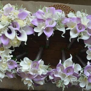 Lilac Wedding Bouquets, Real touch lilac Calla Lilis, Ivory Plumerias, Ivory Roses, Dusty Millers, Light Purple Bouquets Purple Boutonnieres