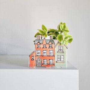 Small handmade ceramic planter of row of houses, series one. Happy vase for plants, perfect for cactus or succulent