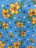 Turquoise Polycotton Print Fabric Yellow Lily Flowers and white and blue circles