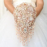 Cascade rose gold brooch bouquet. Jeweled wedding bouquet. Great gatsby bling bouquet