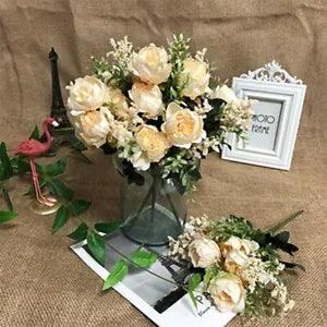 Hand-tied silk peony bouquet with cream and white blooms in glass vase