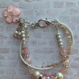 triple strand, interwoven, pink white, seed pearls, pink flower charm