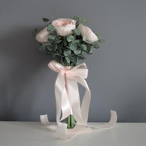 Wedding bouquet with ranunculus. Author's bouquet of the bride. Wedding bouquet Real Touch Flowers for the bride Delicate wedding bouquet