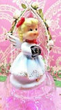 Vtg January Christmas Carnation Angel Shopper Girl W Red Hair Bow Hand Muff