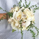Seashell flower wedding bouquet with White Roses