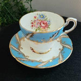 Paragon Fine Bone China England, Vintage Footed Tea Cup and Saucer, Sky Blue Band Gold Scrolls w/ Floral Bouquet Scalloped Edges (E104H)