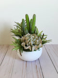 Faux succulent arrangement; Small white oval vase succulent arrangement faux plants