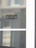 Window vinyl decal sign: “Please Place Packages in the Bin”
