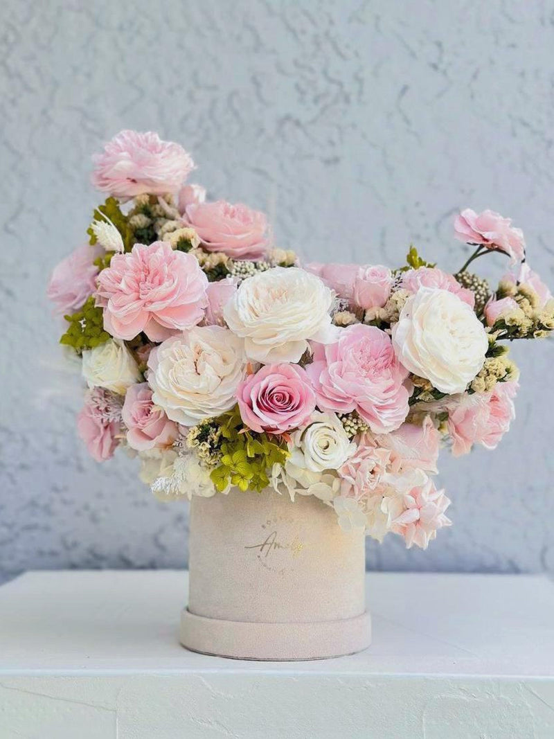 Forever rose bouquet in beige ceramic vase with white and pink flowers