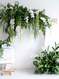Greenery and white floral wedding arch, artificial floral arrangement, festival event or business display wedding flower