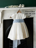 T-length Flower Girl dress classic, ivory silk with ivory silk sash and big bow. Puffy straight sleeves. Under Petticoat,girl wedding dress silk flower