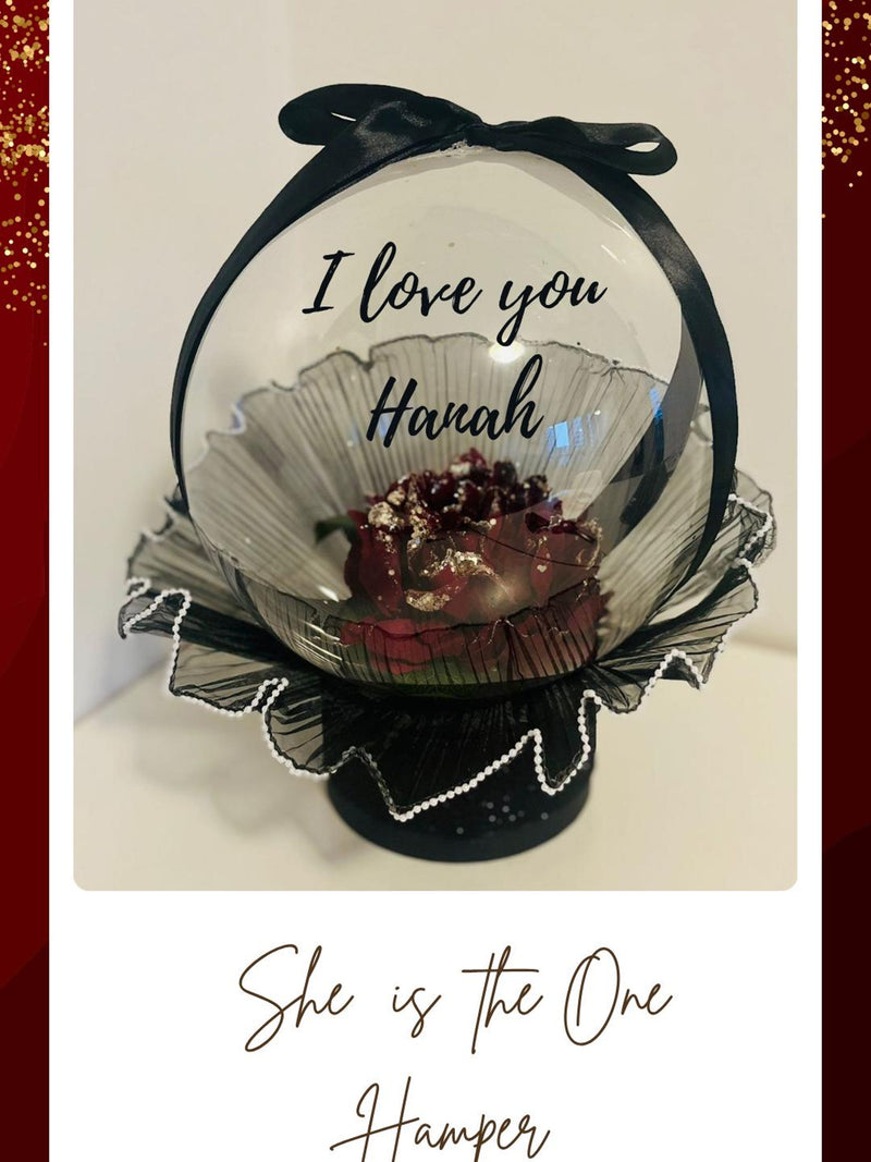 Personalized gift hamper with black bow ribbon, clear dome, “I love you Hanah”