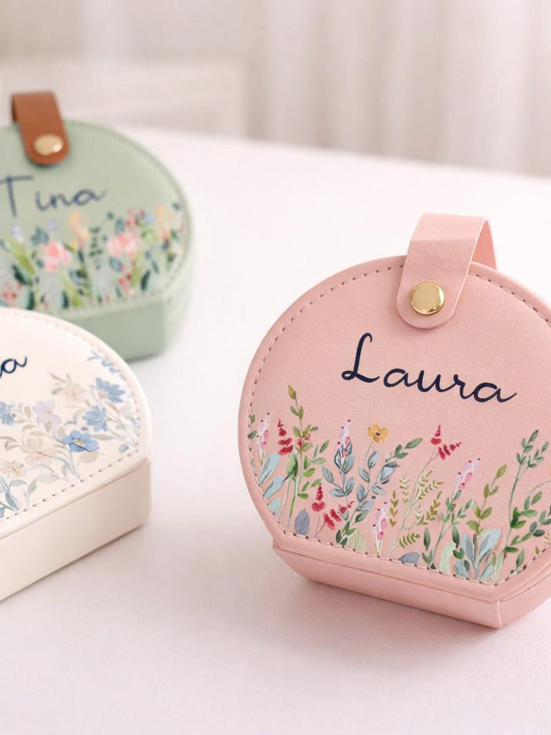 Pink PU travel jewelry box with floral print and gold nameplate, Laura