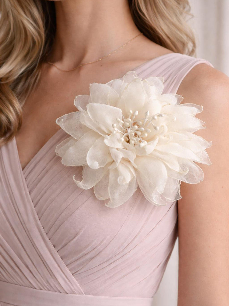 White chiffon flower hair clip with layered petals and pearl-like center