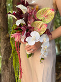 Mauve Burgundy Cymbidium Orchid Bouquet: White Burgundy Calla Lily, white cascading orchid, moss green red Amaranthus, Anthurium silk flower Bouquet