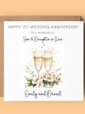 Personalised Son & Daughter-in-Law Anniversary Card: Champagne Glasses, Flowers ANNIVERSARY
