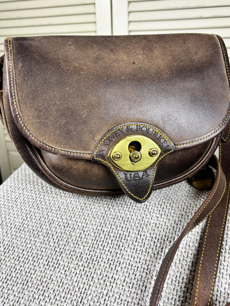 Reserved 1980s Dooney & Bourke Gundelta Cavalry Trooper Brown Leather Saddle bag silk flower