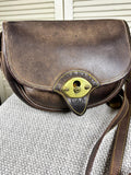 Reserved 1980s Dooney & Bourke Gundelta Cavalry Trooper Brown Leather Saddle bag silk flower