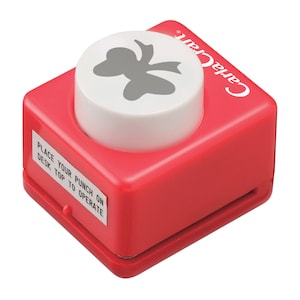 Red craft ribbon paper punch with white flower-shaped cutting die