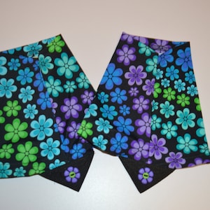 Floral gaiter with blue, green, and purple blossom pattern