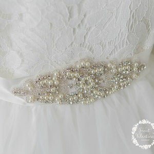 White rhinestone and pearl wedding sash with ornate crystal center panel
