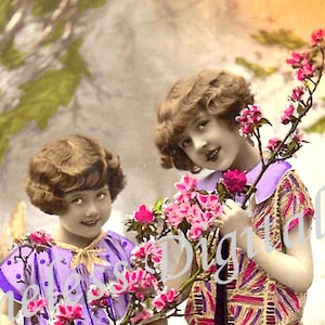 Vintage postcard illustration of two girls holding pink flowers on a floral branch