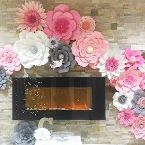 Pink and white giant paper rose flower backdrop with layered 3D blooms