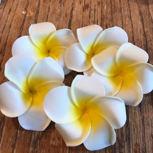 Foam plumeria flower heads, white petals with yellow centers, set of 10