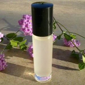 Antonia Flowers fragrance roll-on oil bottle with black cap and clear roller, 10 ml