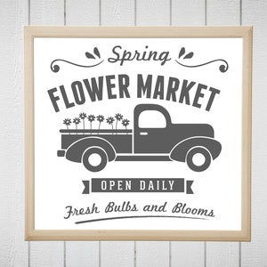 Rustic spring flower market sign with delivery truck and open daily lettering
