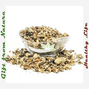 Organic dried mullein flowers in silver bowl with loose herb heap