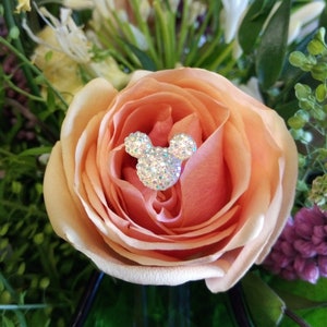 Crystal Mickey Mouse heart flower pin on peach rose bloom
