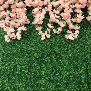 Dark green foliage and pink flower wall panel decor